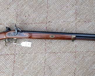 THOMPSON CENTER ARMS .50 CALIBER RIFLE WITH LYMAN PEEP SIGHT INSTALLED