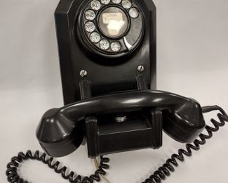 AUTO ELECTRIC BLACK WALL DIAL TELEPHONE. AKA JUKEBOX PHONE. HAS CORD ADDED TO WORK IN CURRENT PHONE JACKS. WORKS - MAKES AND RECEIVES CALLS, RINGS