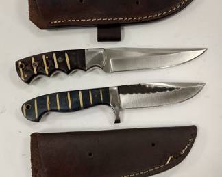 TWO C.F.K. KNIVES WITH SHEATHS