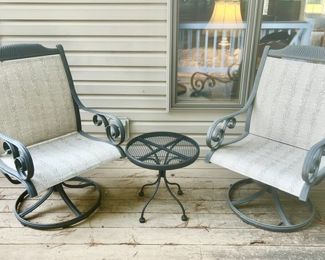 2 rocking/swivel patio chairs with side table