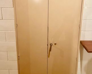 Large upright metal storage cabinet