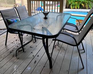 Metal and glass table with 6 chairs