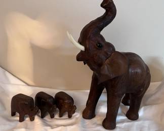 Small wood and large leather elephants