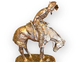Rare Large Plated Silver Bronze Sculpture After Frederic Remington (American, 1861-1909) Entitled NORTHER. Marked Limited Edition and affixed atop a large marble plinth. Approx. Dimensions: Sculpture: 18" W x 21" H x 7" D; With base: 20" W x 38" H x 14" D.  Marked by Henry Bonnard Founders, New York Cast.