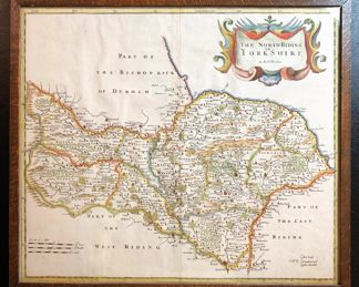 Original 1695 First Edition Hand-colored Map THE NORTH RIDING OF YORKSHIRE by Robert Morden (c. 1650 - 1703) | A very nice copper engraved original antique Double page map of North Yorkshire shown divided into wapentakes. The county and district borders highlighted with outline coloring, also with hand coloring to the decorative title cartouche, the map border and the distance scale. Blank on verso. Published in the first edition of Edmund Gibson's revision of Camden's Britannia | In very good to excellent condition (with central fold as issued).