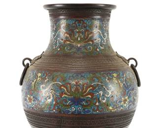 Large Antique Original 19th c. Japanese Meiji Champleve Bronze Enamel Vase | Beautiful solid bronze with champlevé inlay throughout, applied mask with ring, bottom has been drilled for lamp, otherwise excellent original condition | Approximate size & weight: 15.5” H x base 7.5” Diameter w/ opening 7.25” Diameter, Weight: 10 lbs.