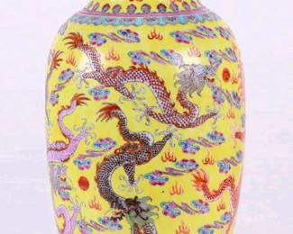 Fine Antique Chinese Ching Dynasty Qianlong Period (1736-1795). Yellow Glaze Porcelain Dragon Vase signed with a iron-red Qianlong seal mark. In excellent condition with no noticed damage or repairs. Approx. Size: 18" tall x 8" diameter.