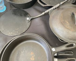 Cast iron pots and pans, many