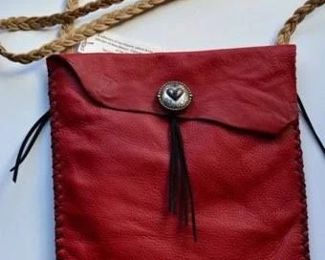 Leather work and jewelry by the artist's daughter