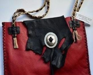 Leather work and jewelry by the artist's daughter