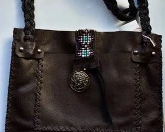 Leather work and jewelry by the artist's daughter