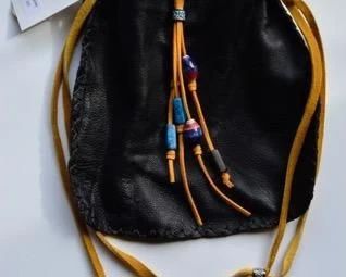 Leather work and jewelry by the artist's daughter