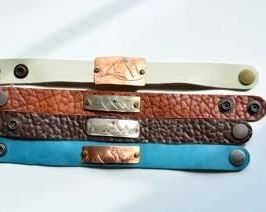 Leather work and jewelry by the artist's daughter