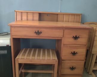 Antique four piece bedroom set
Makeup table and chair, headboard and matching dresser