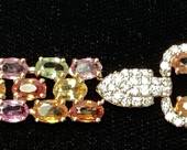 14KT YELLOW GOLD MULTI-COLOR SAPPHIRE & DIAMOND BRACELET, 7''L, 21.36ct SAPPHIRES, 1.46ct DIAMONDS, 21.2g,
AIGL APPRAISAL $16,478, 
