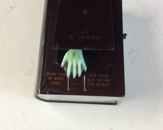 VINTAGE SKELETON HAND TIN BANK