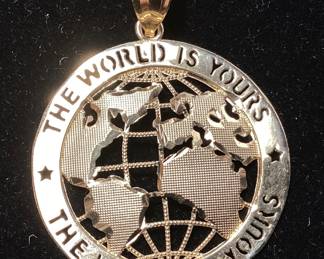 10kt GOLD ‘’THE WORLD IS YOURS’’ CHARM, 3.8g,