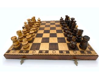 Carved wood chess set with folding chess board box