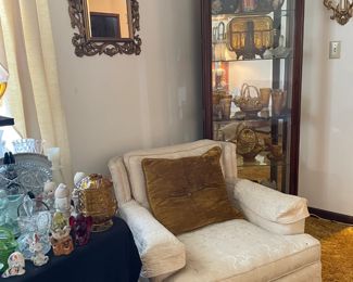 VINTAGE CHAIR AND LIGHTED CURIO