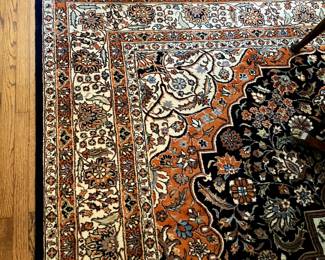 Orange and blue area rug 9’ x 12’