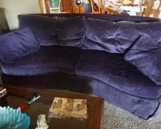 purple curved couch