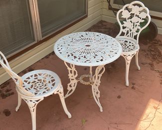 Wrought iron table and chairs.