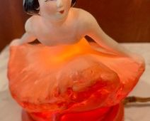 Gulper Pottery Art Deco Ballerina Lamp measuring 6 inches tall. The cord has lots of damage and there is perfume residue around the edges of the base where the light bulb sits. There is vintage wear to the paint. Please see details in the photo gallery. Isn't she sweet! 