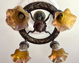 Antique Ceiling Chandelier with Durand Glass Shades. A gorgeous chandelier with pineapple details accented with stunning glass shades. 
