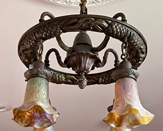 Antique Ceiling Chandelier with Durand Glass Shades. A gorgeous chandelier with pineapple details accented with stunning glass shades. 