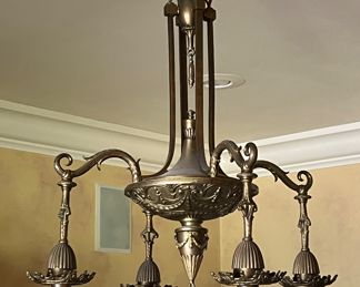 Gorgeous Dining Room Chandelier Four with Quezal Glass Shades. 

A beautiful ornate brass intricately designed fixture paired with four beautiful Quezal white and Aurene glass shades. 

Measures about 35" long and 19" wide with each shade measuring about 4.5" long. 