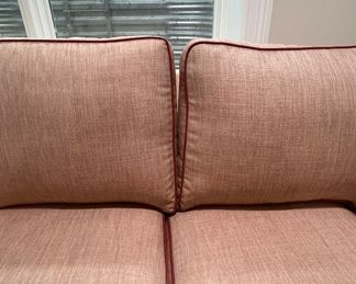 Merchandise Mart Sourced Two-Piece Sectional Sofa Upholstered in Salmon-Colored JF Fabrics High-Performance Fabric with Leather Trim. Left Section Measures 74" L x 38" D; Right Section Measures 88" W x 38" D. Photo 3 of 5.