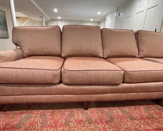 Merchandise Mart Sourced Two-Piece Sectional Sofa Upholstered in Salmon-Colored JF Fabrics High-Performance Fabric with Leather Trim. Left Section Measures 74" L x 38" D; Right Section Measures 88" W x 38" D. Photo 4 of 5.