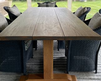 Lloyd Flanders Live Edge Premium Teak Dining Table. Measures 99" L x 40" D x 30" H. Photo 1 of 2.
