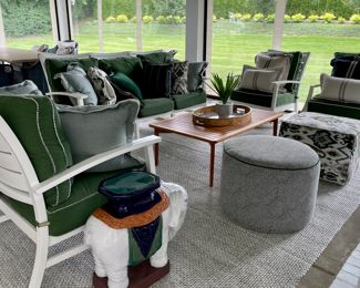 Summer Classics White Aluminum Outdoor Furniture - Three Seat Sofa, Love Seat, Swivel Rocker and Glider Chair. Shown with Outdoor Table, and Two Outdoor Poofs.