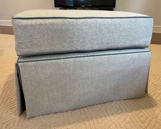 Kravet Ottoman Upholstered in Light Grey Herringbone Fabric with Contrasting Dark Grey Faux Leather Trim. Measures 22" x 28" x 21" H. Photo 1 of 3.