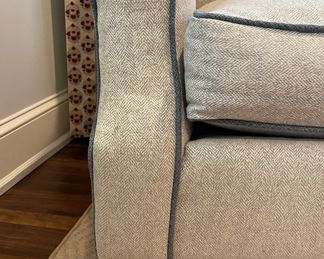 Pair of Kravet Club Chairs Upholstered in Kravet Light Grey Herringbone Fabric with Contrasting Faux Leather Trim. Each Chair Measures 36" W x 36" D. Photo 3 of 4.