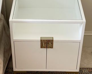 Pair of White Lacquered Glass-Top Side Tables with Shelf and Brass Hardware. Measures 20" W x 18" D x 23.5" H. Photo 2 of 3.