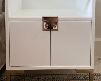 Pair of White Lacquered Glass-Top Side Tables with Shelf and Brass Hardware. Measures 20" W x 18" D x 23.5" H. Photo 1 of 3.