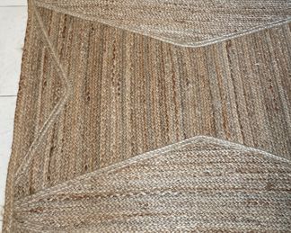 Woven Natural Fiber Jute Rug. Measures 11' 9 x 9." Photo 1 of 2.