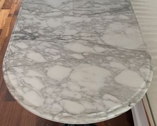 Calcutta Gold Marble Top Three-Pedestal Bistro Table with Wrought lron Base. Measures 80" L x 26" D x 31" H. Photo 2 of 4.