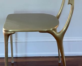 Set of 4 CB2 Oro Gold Outdoor Dining Chairs. Each Measures 17.5" x 16" D x 18" Seat Height. Photo 2 of 4.