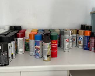 Full To Half-Full Spray Paint Canisters.