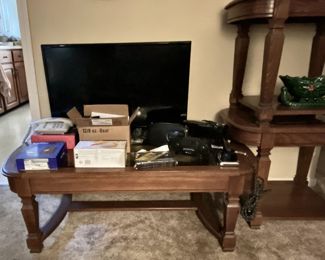 samsung tv, old phones, radios, side tables and coffee table