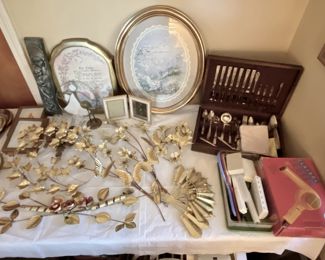 vintage silverware, gold wall hangings, pictures