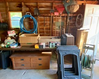 pool supplies, books, outdoor tools, saw horses, hose reel, hope chest