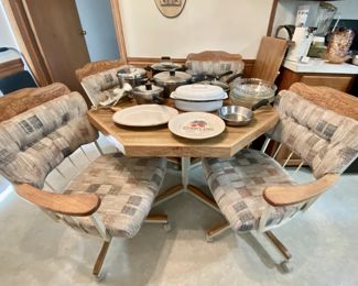 dining table and rolling chairs, pots and pans