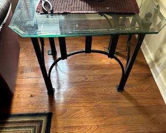 Three matching glass end tables
