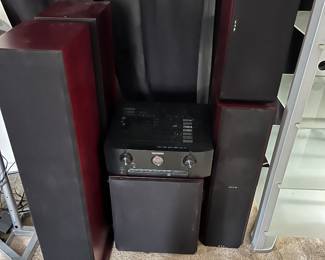 Marantz system with HTS subwoofer, two tower speakers, two side and one center speakers.