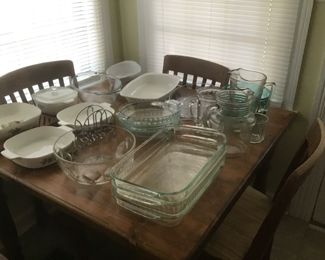 Kitchen table with four solid library chairs  Pyrex, corning, Campbell soup casserole