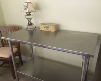 Stainless steel table that can be used as an island